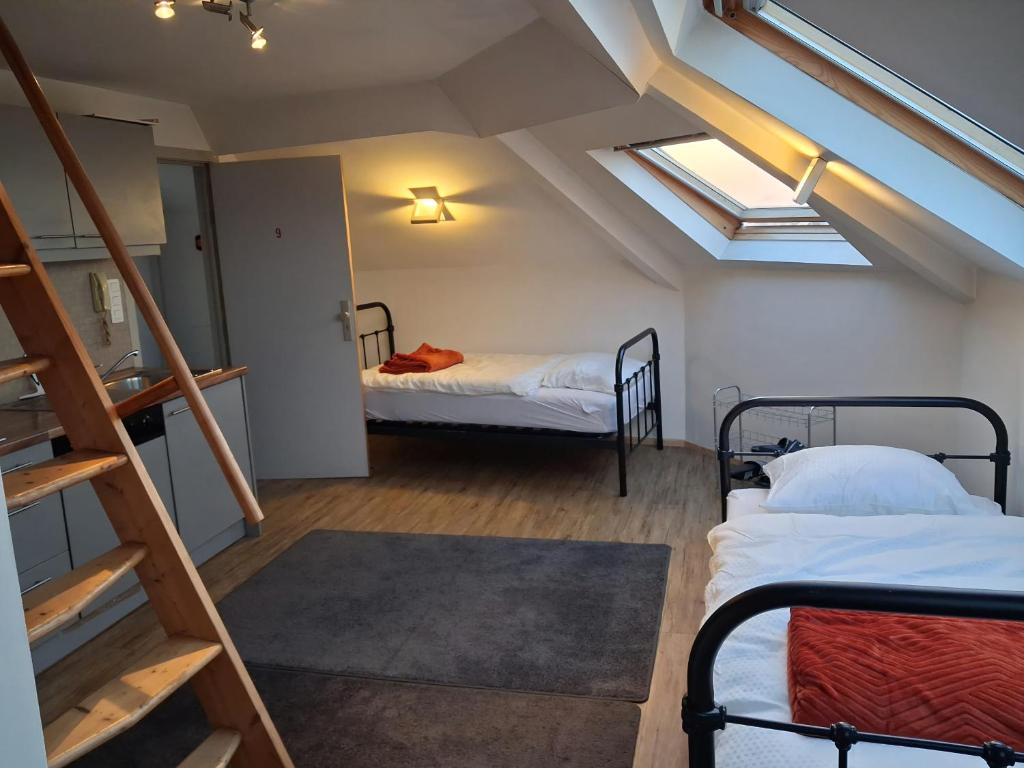 Postel nebo postele na pokoji v ubytování Apart studio9