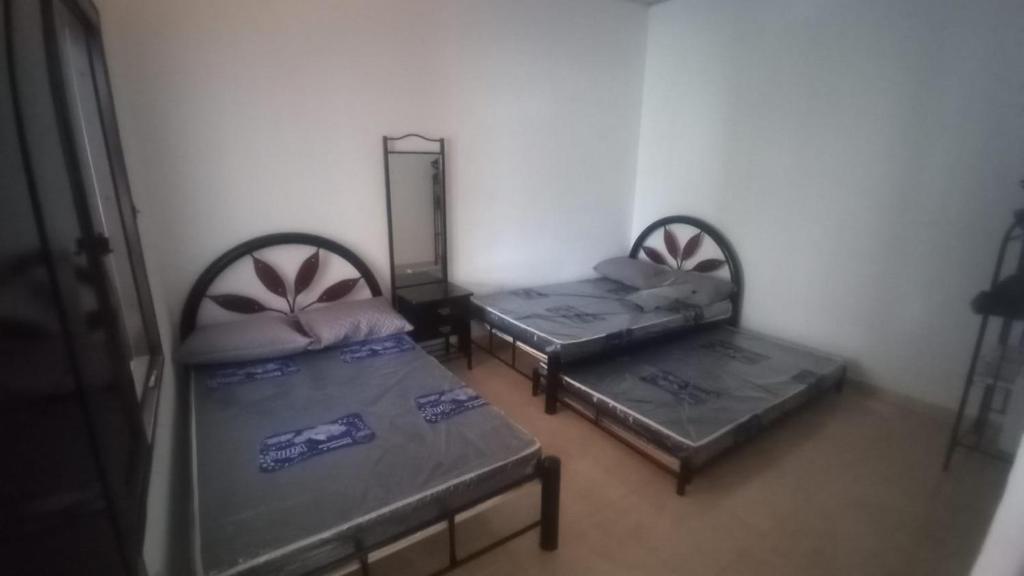 En eller flere senge i et værelse på apartamento Carmen de Apicala