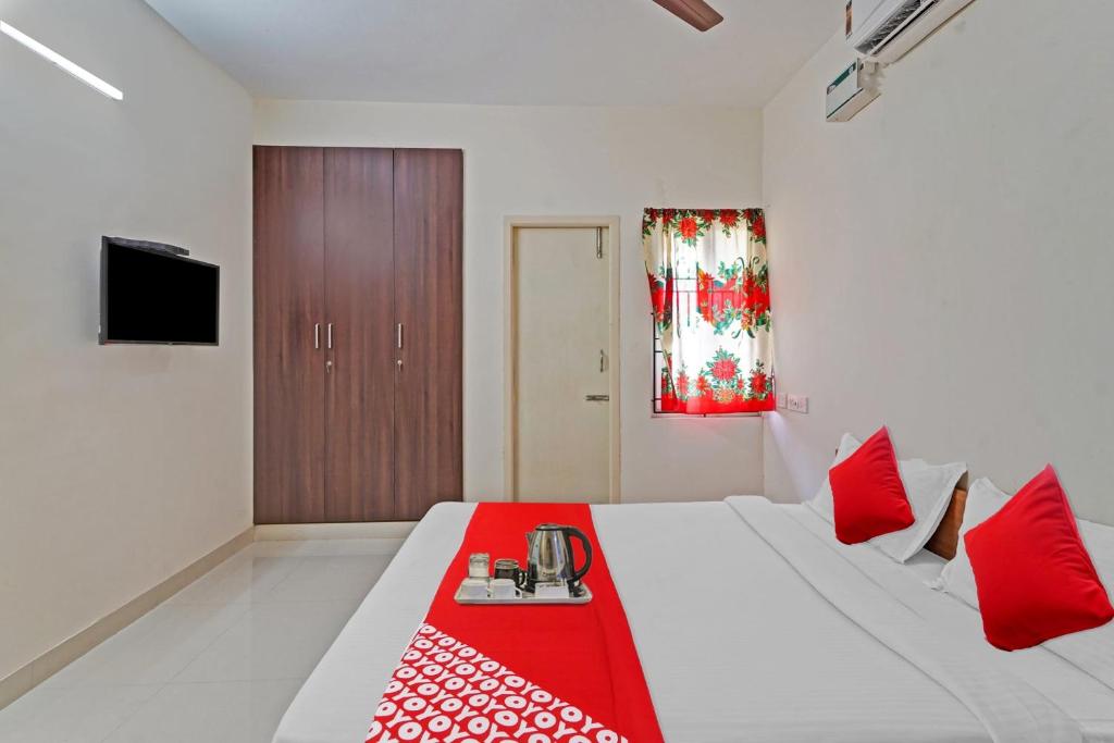 Postel nebo postele na pokoji v ubytování HOTEL O J2 SERVICE APARTMENT