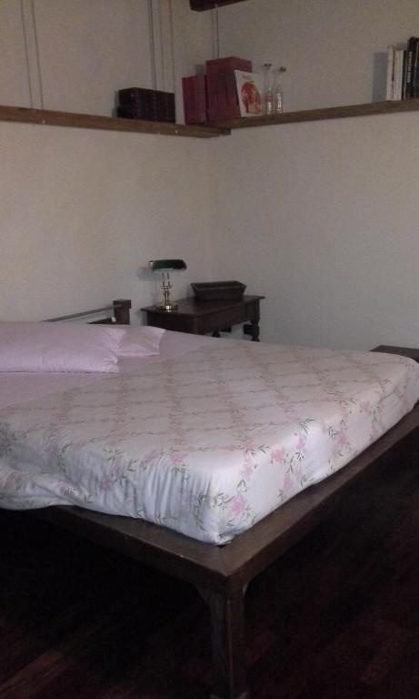 Postel nebo postele na pokoji v ubytování B&B Ai Tre Confini