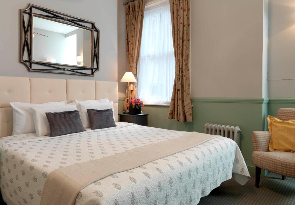 Postel nebo postele na pokoji v ubytování Fielding Hotel