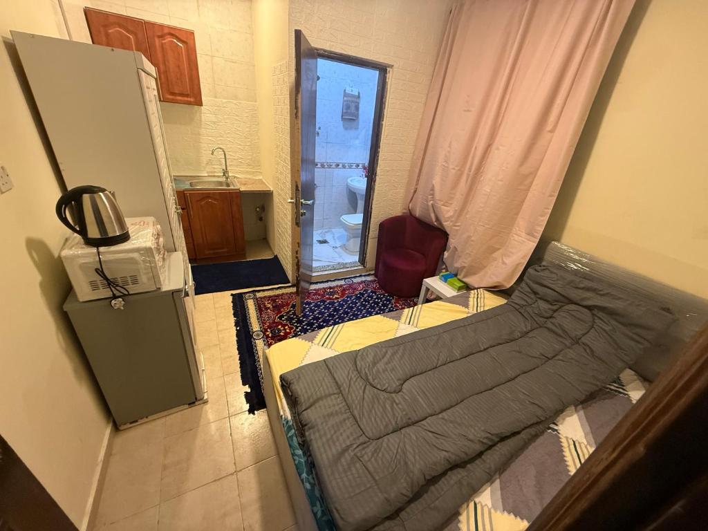 Kuchyň nebo kuchyňský kout v ubytování Studio with parking 10 minutes from Zayed Airport Abu Dhabi For Single or Couple travellers