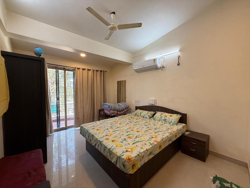 En eller flere senge i et værelse på Tranquill Villa