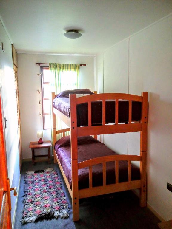 Postel nebo postele na pokoji v ubytování Hostal Torre de Babel