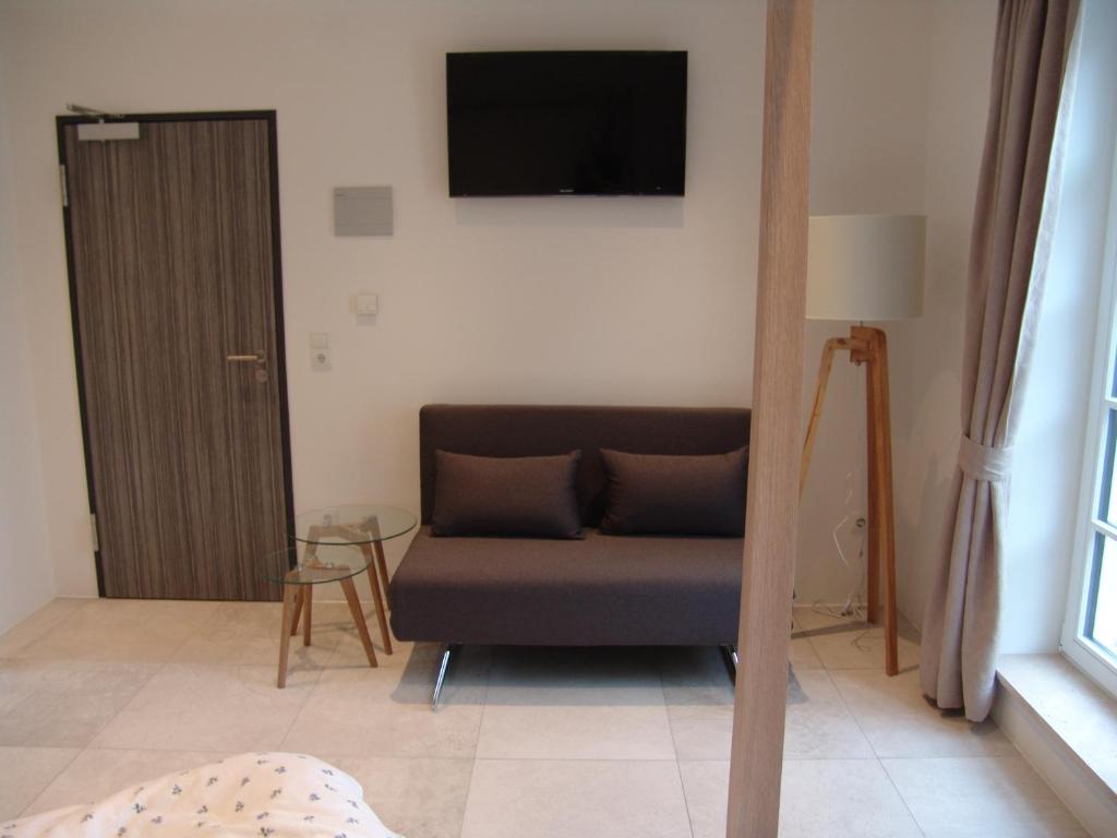 Posezení v ubytování Bella Riva Hotel