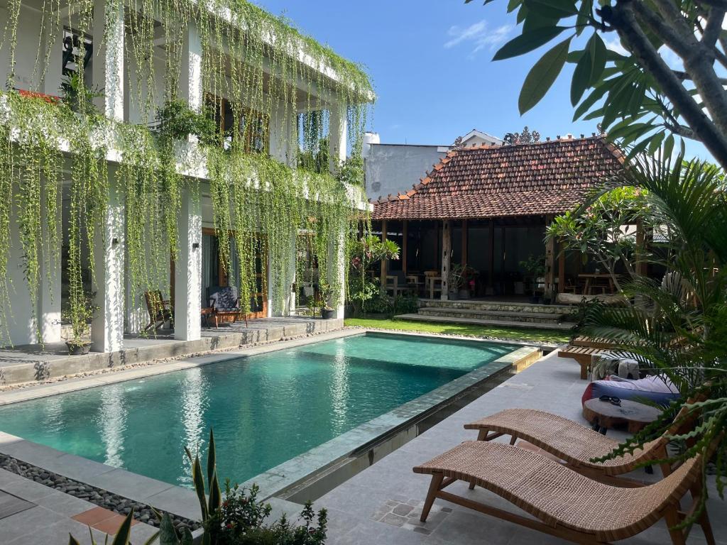 Bazén v ubytování Nextdoor Rooms nebo v jeho okolí