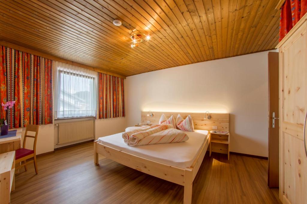 Posteľ alebo postele v izbe v ubytovaní Residence Silvia