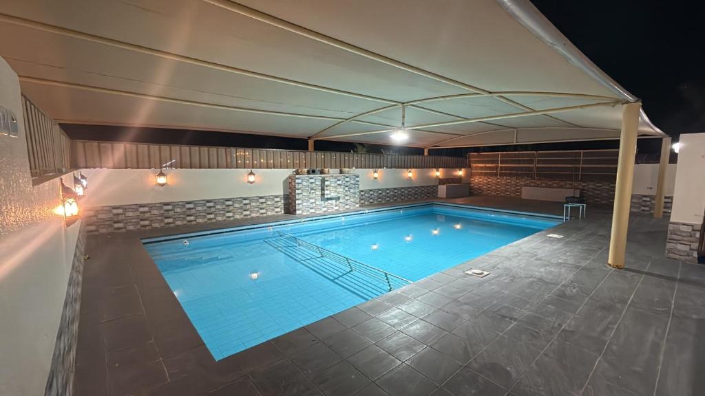 Bazén v ubytování Oasis bahla nebo v jeho okolí