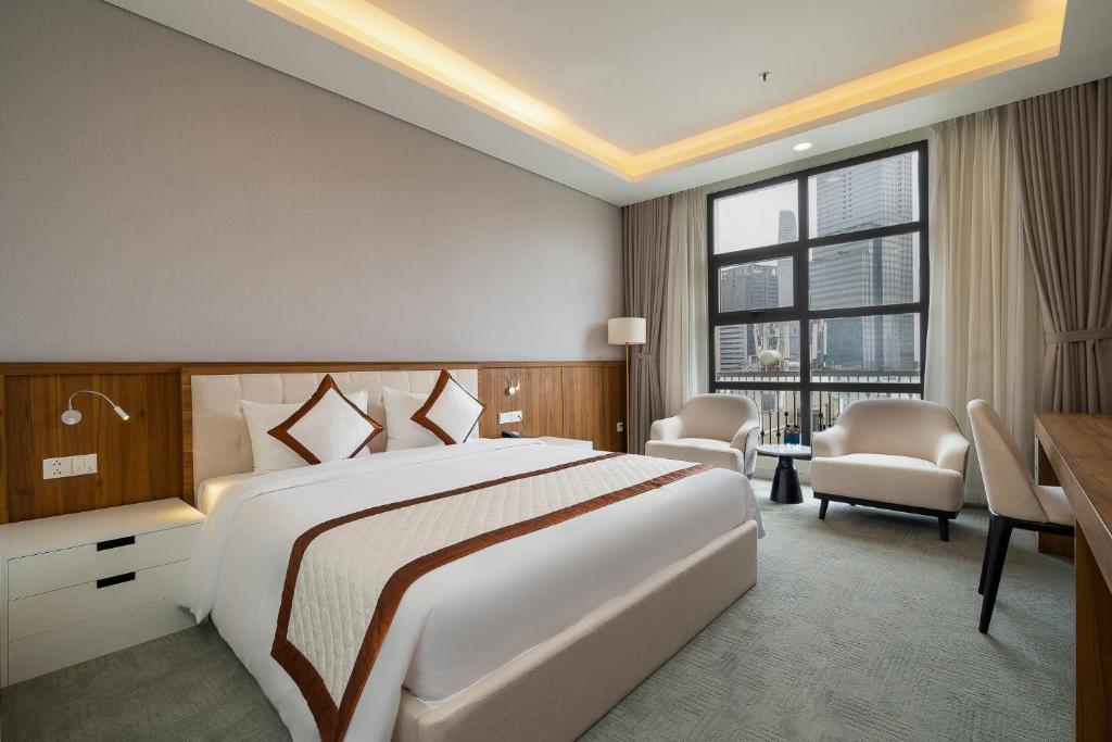 En eller flere senge i et værelse på Ben Thanh One Step Prime