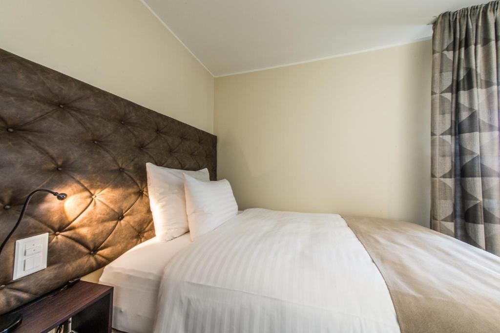 Ένα ή περισσότερα κρεβάτια σε δωμάτιο στο Hotel My Way Zürich Wallisellen
