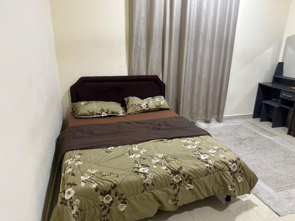 Ένα ή περισσότερα κρεβάτια σε δωμάτιο στο Mabillah muscat