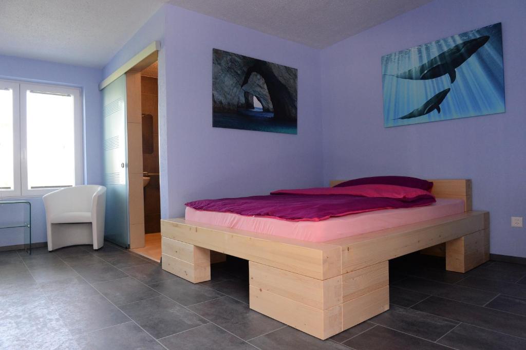 Postel nebo postele na pokoji v ubytování Hotel Belp Bern Airport Free Parking