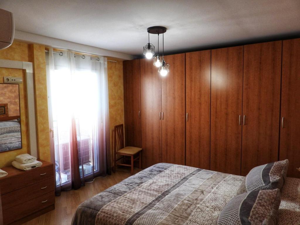 Ένα ή περισσότερα κρεβάτια σε δωμάτιο στο Casa el Alfar mudéjar