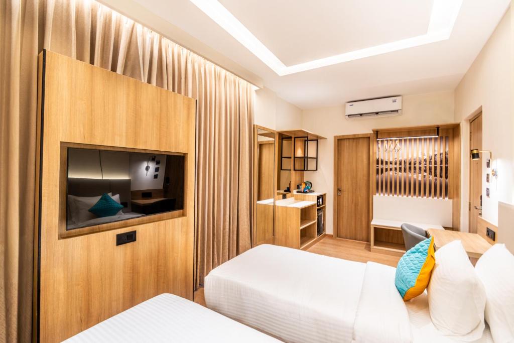 Postel nebo postele na pokoji v ubytování Hotel Lenexa by Bestinn Leisure