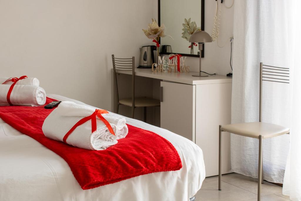 Postel nebo postele na pokoji v ubytování PIUMABLU