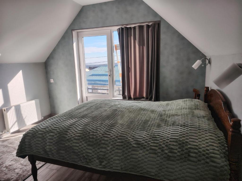 En eller flere senge i et værelse på AGA Frame