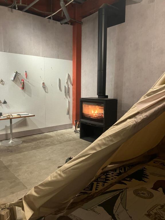 Μια τηλεόραση ή/και κέντρο ψυχαγωγίας στο 川辺-kawabe 悠- 川遊び-BBQ