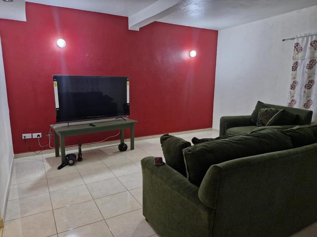 Televizorius ir (arba) pramogų centras apgyvendinimo įstaigoje St Lucie Suite