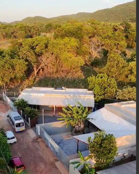 an overhead view of a building with a van parked in front at Pousada Do Gael in Estivado