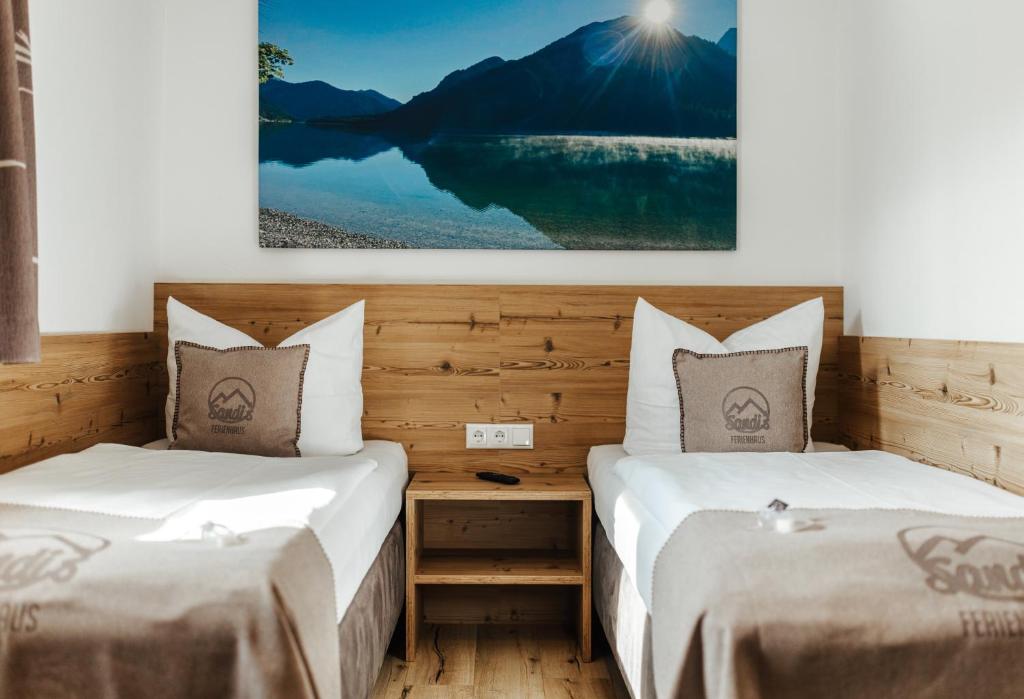 Postel nebo postele na pokoji v ubytování Sandi`s Ferienhaus