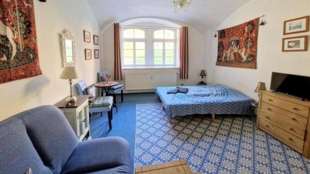 Postel nebo postele na pokoji v ubytování Elbenland Apartments Sächsische Schweiz