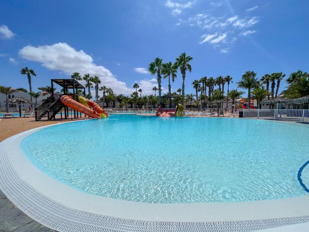 Oasis Dunas 406 near the pool by B-Rent