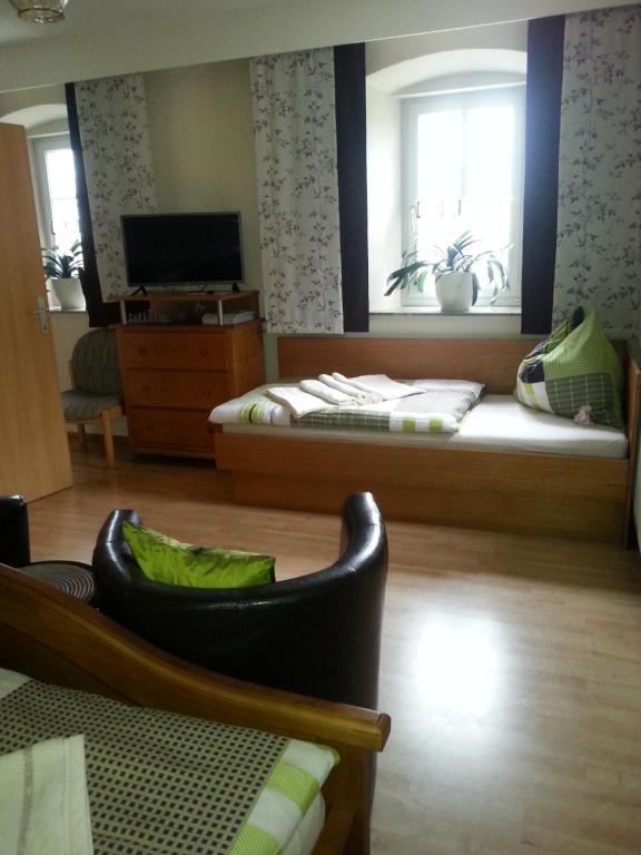 Postel nebo postele na pokoji v ubytování Ferienhaus Planetz