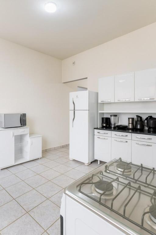 Køkken eller tekøkken på Casa 2 min prox Madrecor com Garage, Ar condicionado