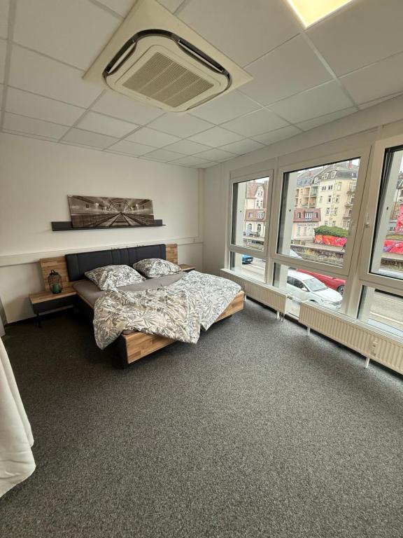 Postel nebo postele na pokoji v ubytování Schlossberg Residence