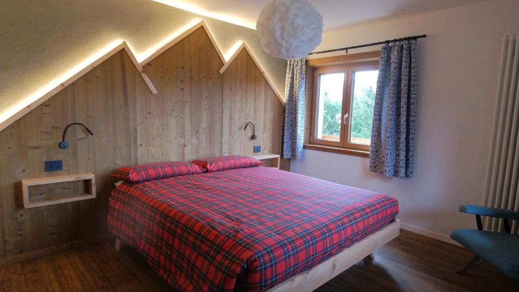 Postel nebo postele na pokoji v ubytování Chalet Peter