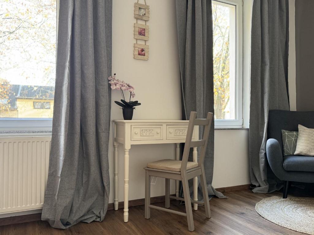 Posezení v ubytování Themenzimmer Pusteblume Nähe Hauptbahnhof