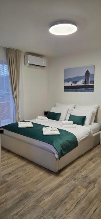 Postel nebo postele na pokoji v ubytování Grand Apartman - 5 Star Luxury Podhajska Apartman