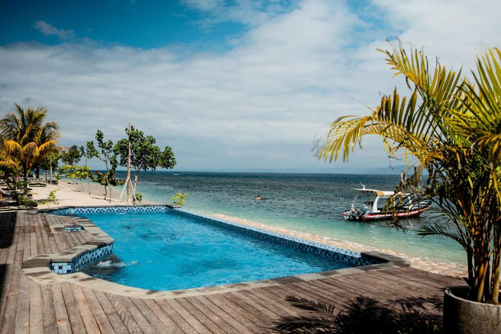 تصویر اتاق‌های Blue Harbor Beachfront Villas & Resto - تصویر ۲