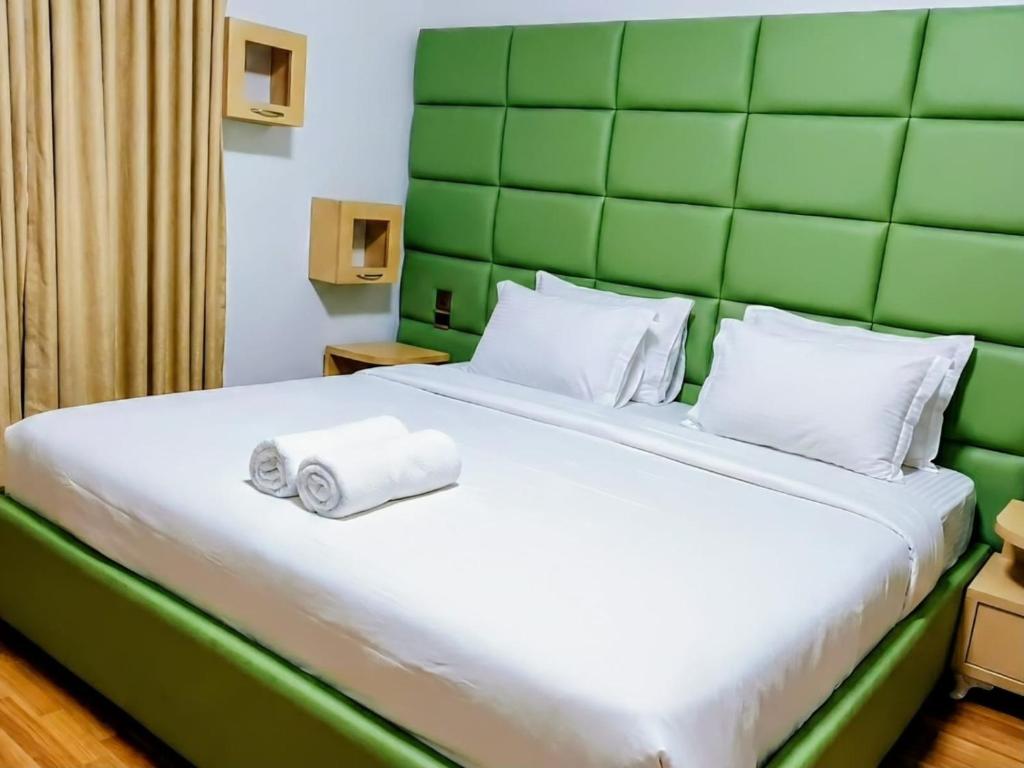 Postel nebo postele na pokoji v ubytování City Urban Hotel