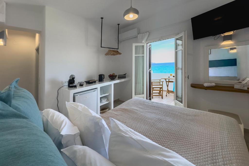 Postel nebo postele na pokoji v ubytování NAMASTEmilos