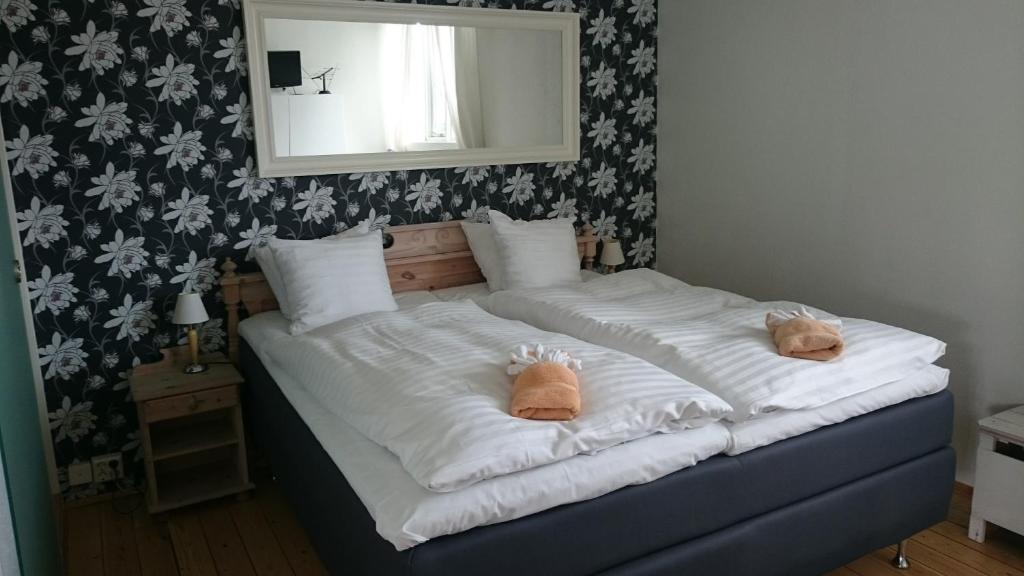 Postel nebo postele na pokoji v ubytování Skogshotell - Cabin - Stuga