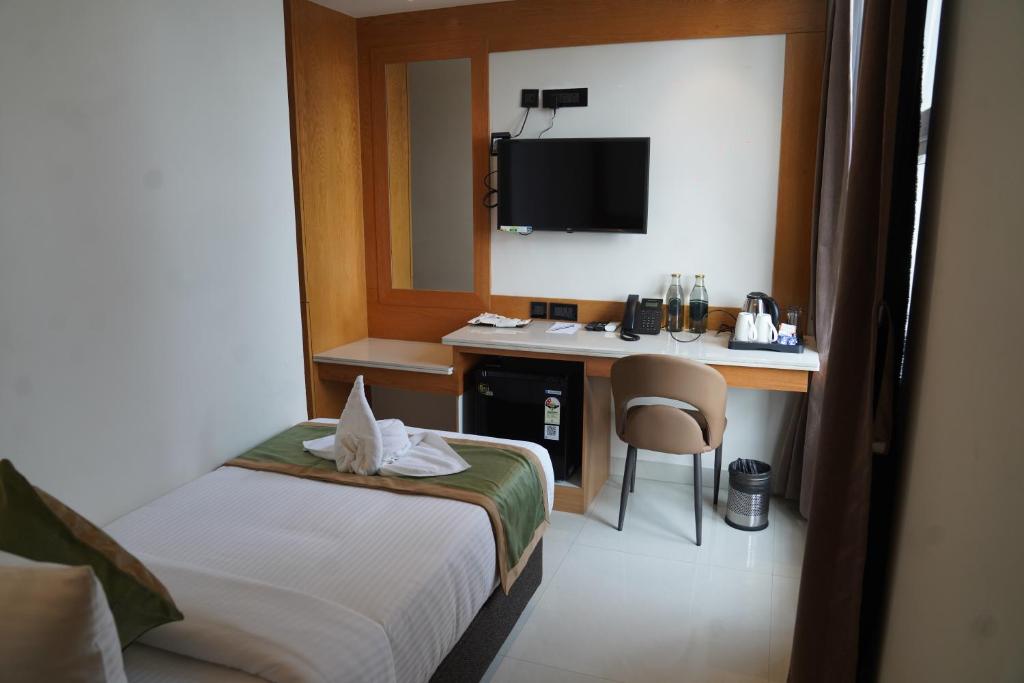 Μια τηλεόραση ή/και κέντρο ψυχαγωγίας στο hotel Green view