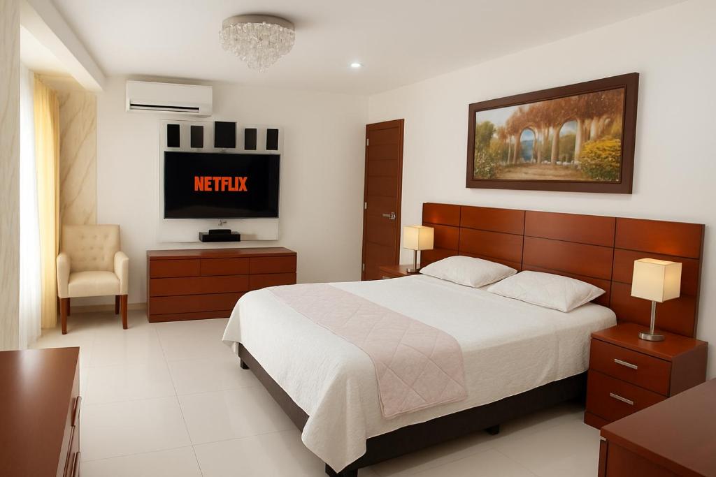 Et tv og/eller underholdning på Deluxe Hotel Talara!