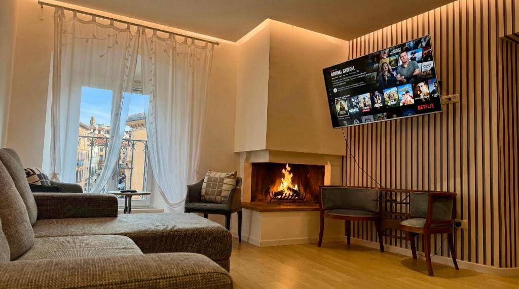 Et tv og/eller underholdning på Respiro - deluxe apartment - super central - only real beds - wifi airco TV65