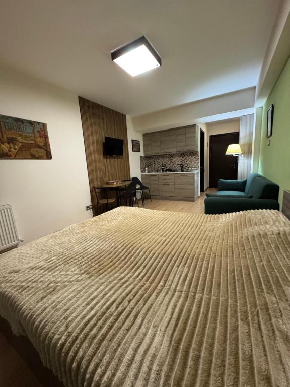 Postel nebo postele na pokoji v ubytování New Gudauri Studio