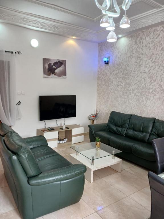 Телевизор и/или развлекательный центр в MAG GUEST house