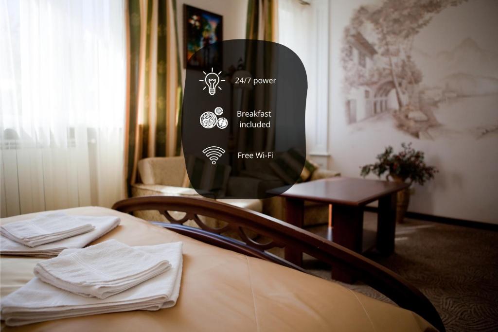 Postel nebo postele na pokoji v ubytování Oselya Hotel