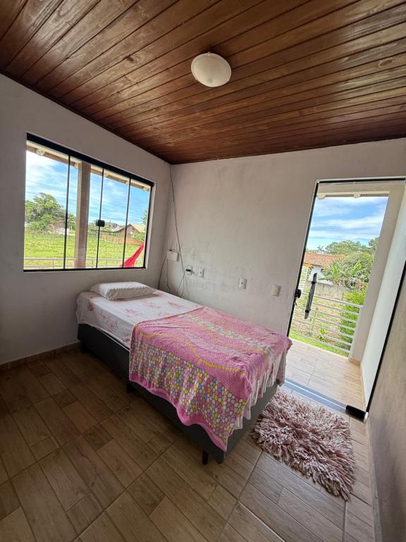 Postel nebo postele na pokoji v ubytování Casa com piscina no Campo D'Una