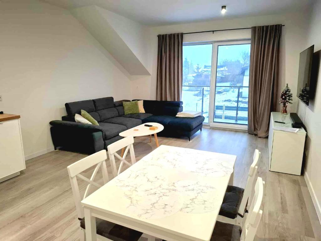 Posezení v ubytování Modern 2023 apartment