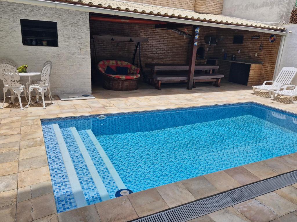 Swimmingpoolen hos eller tæt på Solar dos Reis