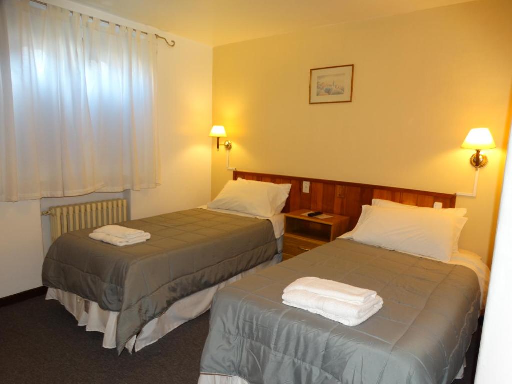 Postel nebo postele na pokoji v ubytování Hosteria La Pastorella
