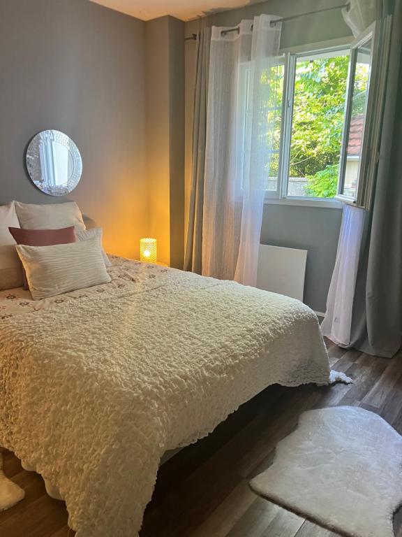 En eller flere senge i et værelse på La rose des sables