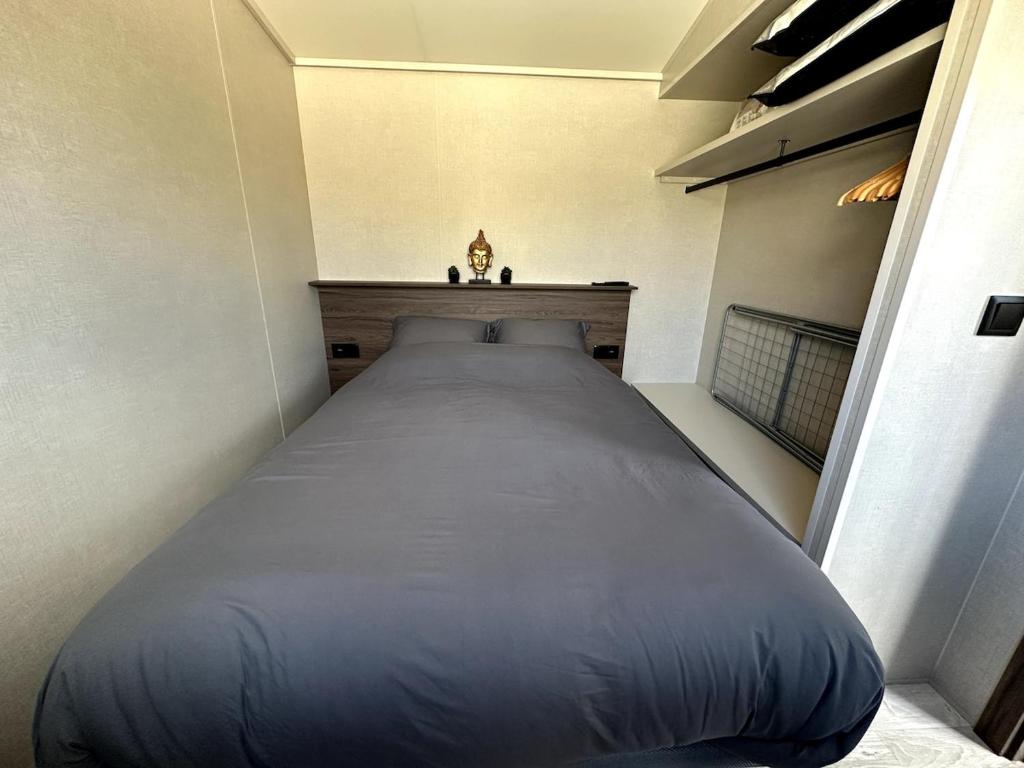 En eller flere senge i et værelse på Tiny house 3 à 4 personnes