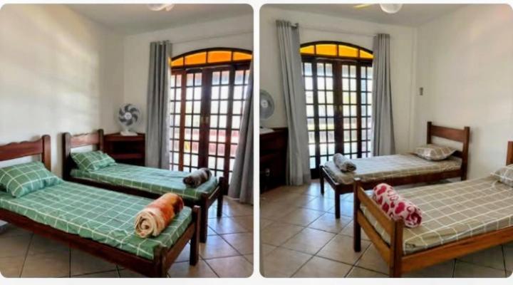 Postel nebo postele na pokoji v ubytování Aconchegante pé na lagoa