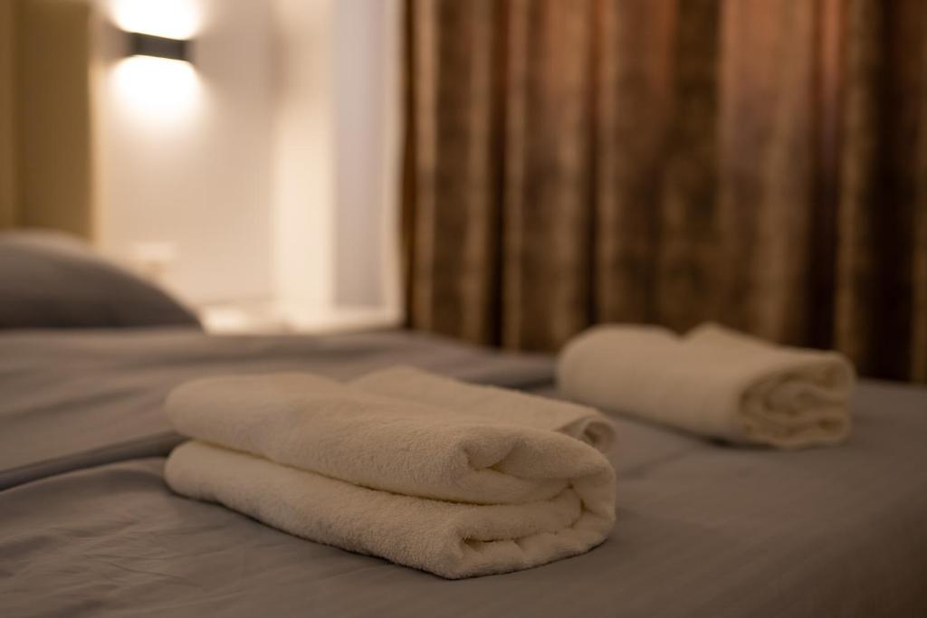 Postel nebo postele na pokoji v ubytování Tirana Dream Apartments & Spa